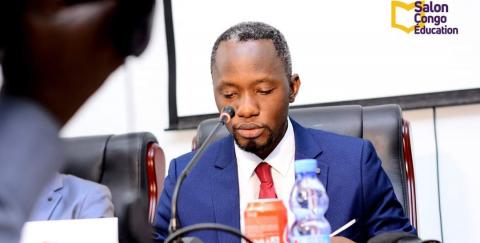 Patrick Kanyinda, coordonnateur de Progress Asbl lors d'une conférence-débat à l'UCC